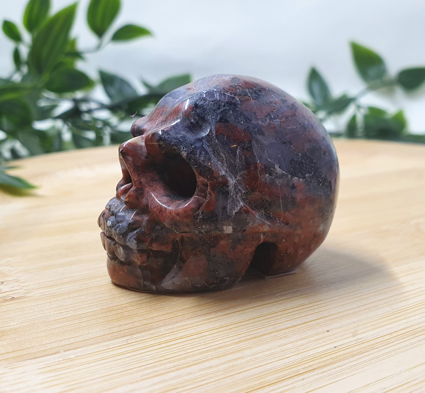 Red Larvikite Skull Carving