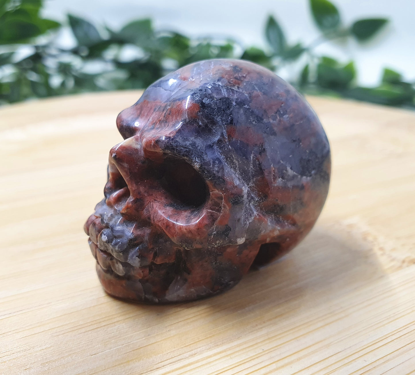 Red Larvikite Skull Carving