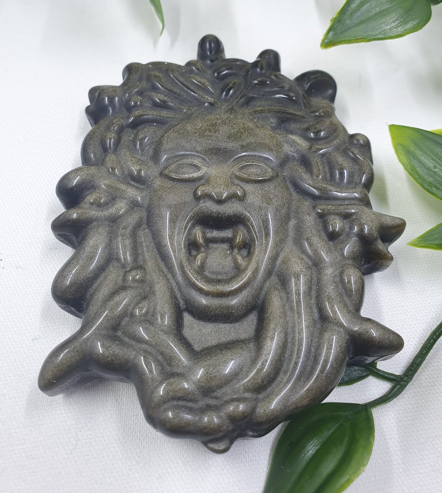 Gold Obsidian Medusa Carving